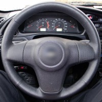 Оплетка на руль из натуральной кожи Opel Corsa D (S07) 2006-2014 г.в. (для руля без штатной кожи, черная)